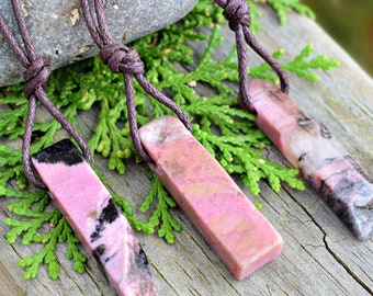 Hand carved wooden necklace with Rhodonite crystals and macrame spiral