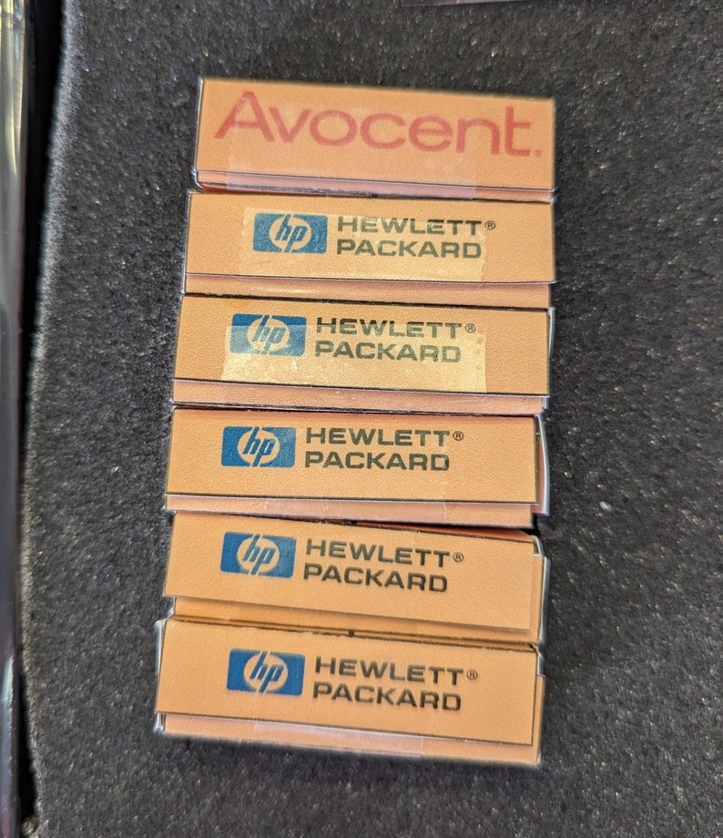 5 tiny HP servers and an Avocent KVM switch with monitor.