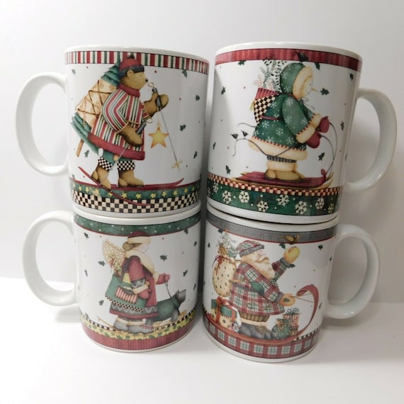 Debbie Mumm Sledding Characters Set of 4 Stoneware Mugs Debbie Mumm Sledding Characters Set of 4 Stoneware Mugs