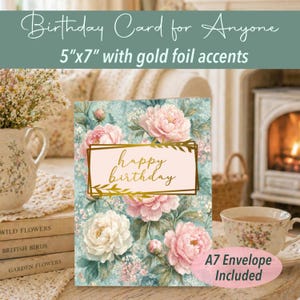 May include: A birthday card with a floral design featuring pink and white peonies on a teal background. The card is 5"x7" with gold foil accents and includes an A7 envelope. The card reads "Happy Birthday" in gold script.