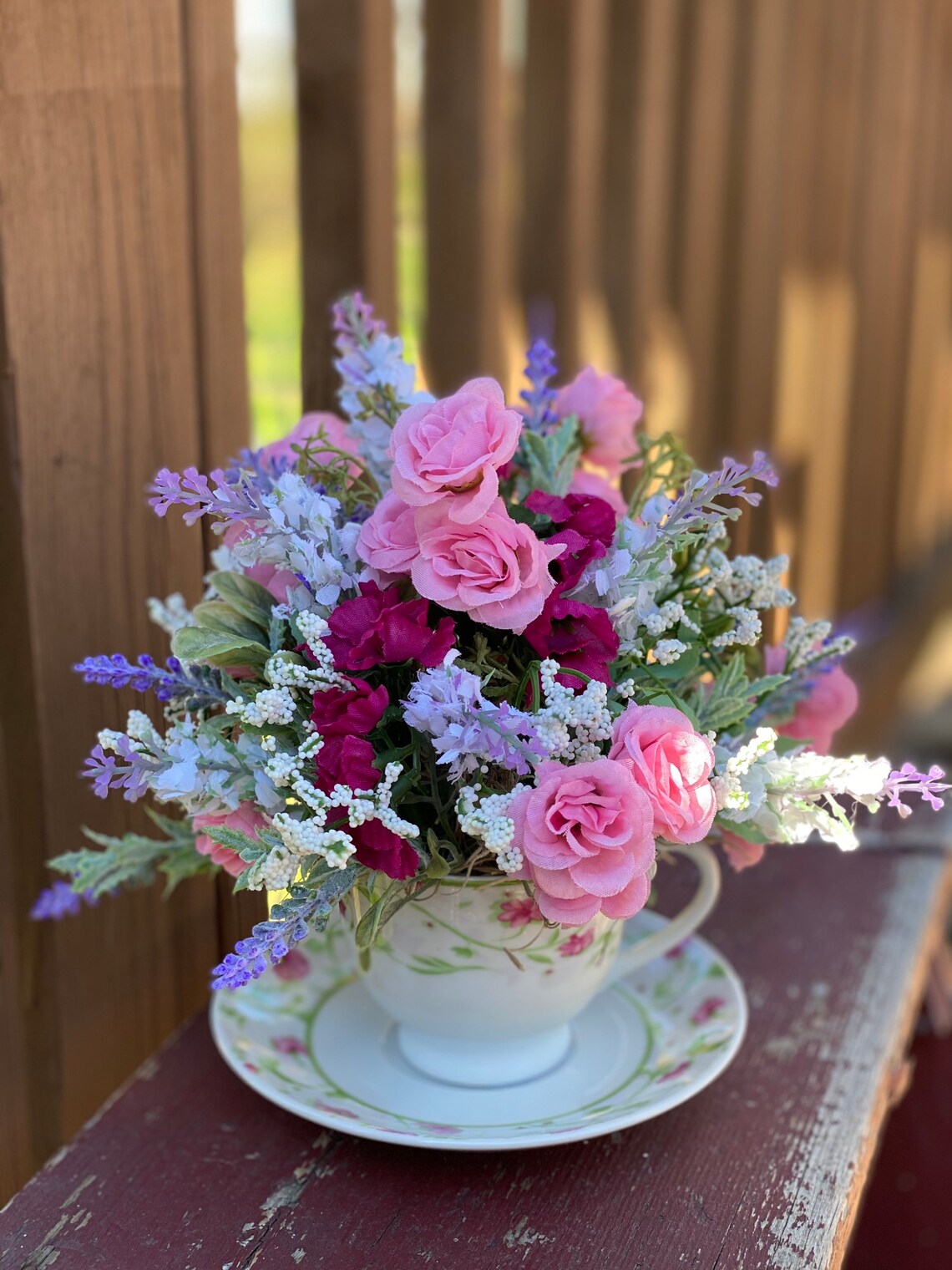 Tea cup and saucer artificial flower arrangement Etsy