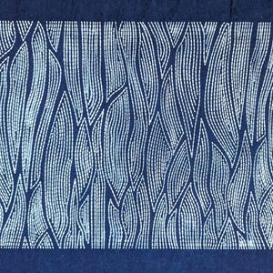 May include: A dark blue textile featuring a white, abstract design. The pattern is composed of vertical lines made of small dots, creating a flowing, organic shape. The design is contained within a rectangular shape, giving the impression of stylized foliage or flowing water.
