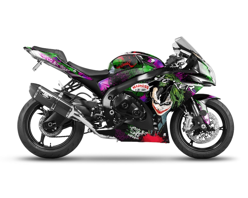 May include: A black and green motorcycle with a Joker graphic and the text "Madness is Like Gravity, It Alls Comes Crashing Down".