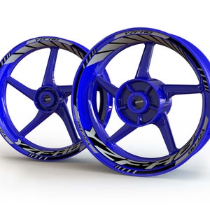 May include: Two blue motorcycle wheels with black and silver YZF-R6 decals.