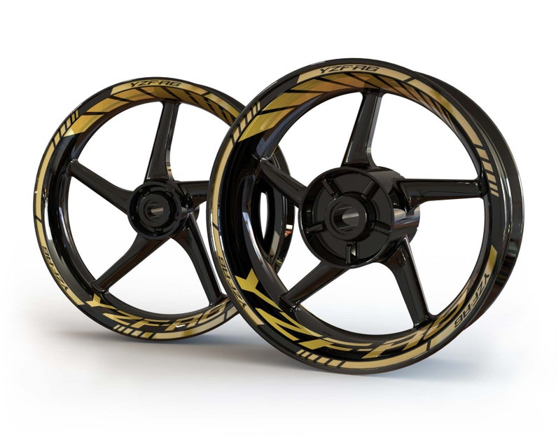 May include: Two black motorcycle wheels with gold YZF-R6 decals. The decals have a black and gold striped design.