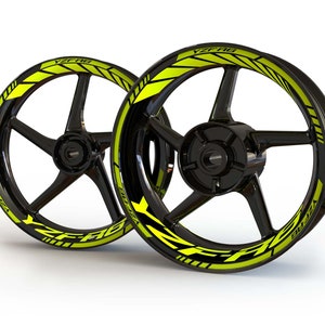 May include: Two black motorcycle wheels with yellow and black YZF-R6 decals.