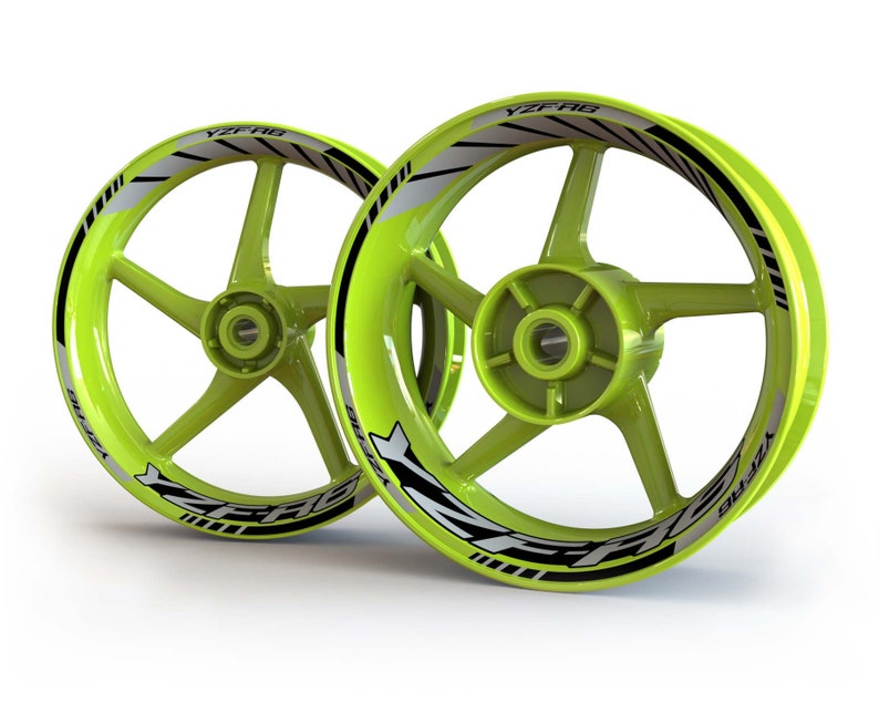 May include: Two green motorcycle wheels with black and white YZF-R6 decals. The wheels have five spokes and a black centre cap.