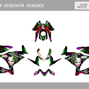 May include: Motorcycle graphics featuring a Joker design with green, black, purple, and red colors. The graphics include the word "Joker" and a comic book style image of the Joker.