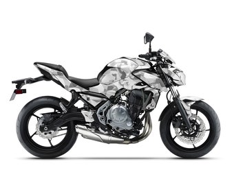 May include: A white and gray camouflage motorcycle with black wheels and a black seat.