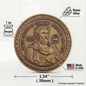 May include: A round brass alloy coin featuring a relief portrait of Marcus Aurelius with the text WHAT STANDS IN THE WAY BECOMES THE WAY, MARCUS AURELIUS AD 121-180, and STOIC. The coin weighs 1 oz and measures 1.54 inches in diameter.