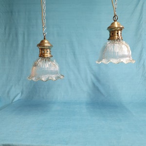 Pair of mid 20th century brass and glass pendant lights Holophane Style