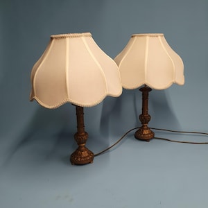 Coppia di lampade in legno dorato dei primi del XX secolo