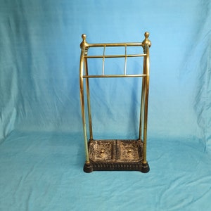 Early 20th century brass sloping front stick stand