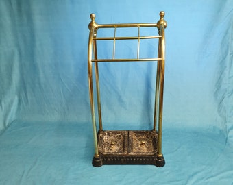 Early 20th century brass sloping front stick stand