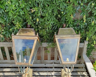 Pair of outside brass porch lights with the letters V R