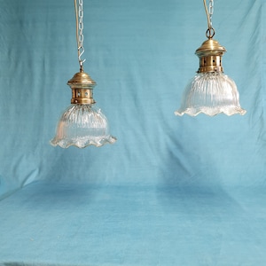 Pair of mid 20th century brass and glass pendant lights Holophane Style