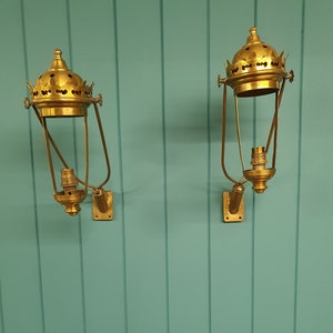 Pair of early 20th-century brass wall lights