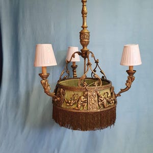 Edwardian brass 4 light chandelier with cherubs