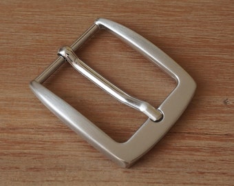 1" 3/16 wide (30 mm) Metal pin belt buckle and satin nickel finish.