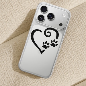 May include: Clear phone case with a black heart and paw print design. The case has a clear back and a protective bumper. The design features a heart shape with a swirl and two paw prints, perfect for pet lovers.