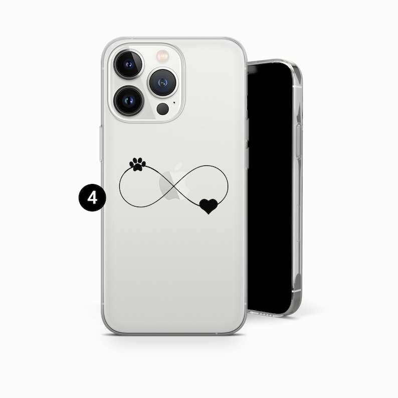 May include: Clear phone case with a black paw print, infinity symbol, and heart design. The case is shown with a black phone next to it. The phone case is designed to protect the phone from scratches and damage.