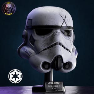 May include: A white Stormtrooper helmet with black accents and weathered detailing, featuring an X-shaped mark on the forehead. It is mounted on a black stand with a plaque reading STAR WARS TASK FORCE 99 CAV Scar Squadron.