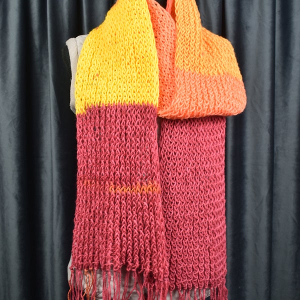 Warm and soft loom knitted scarf. Eye soothing colours