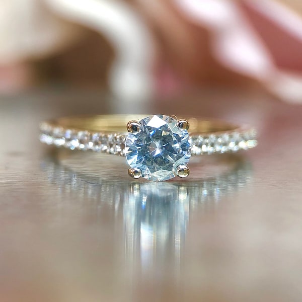 Elegant engagement ring with cubic yellow gold cubic zirconia