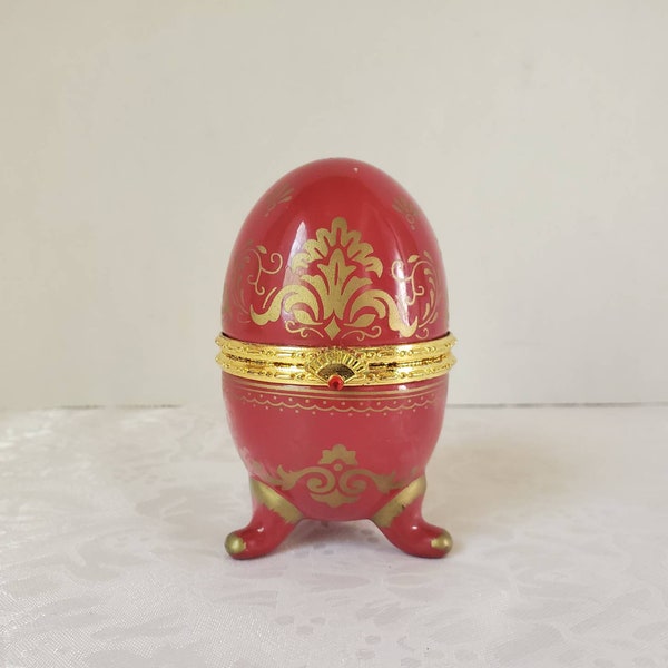 Porcelain Egg Quartz Clock Red with Gold Trim 3 footed