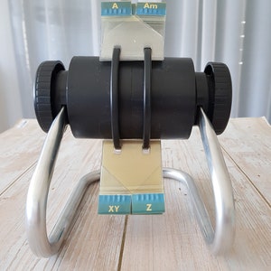 Original and authentic vintage Rolodex rotating card file device, model 1024X with wider role for small cards