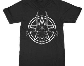 May include: A black short-sleeve t-shirt featuring a white graphic print on the chest. The design depicts a stylized goat head centered within a pentagram, with a small flame icon positioned between the goat's horns and a star on its forehead.