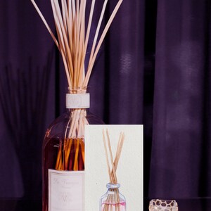 May include: A watercolor illustration of a diffuser bottle with wooden sticks. The bottle is filled with a pink liquid and the sticks are partially submerged. The illustration is on a white background.