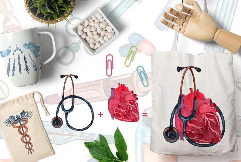 May include: A white tote bag with a watercolor illustration of a red heart and a black stethoscope. The heart is in the center of the bag and the stethoscope is wrapped around it. The bag is on a white background.
