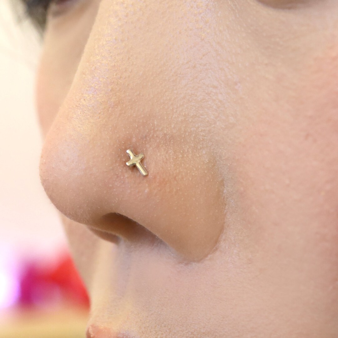 Cross shop nose stud