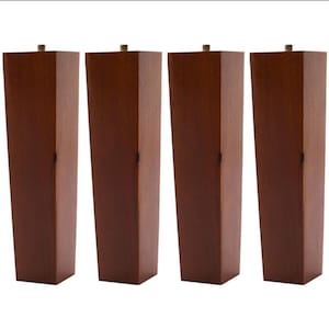 May include: Four wooden furniture legs in a dark brown color. The legs are square shaped and have a slightly tapered design.