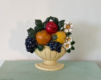 John Wright Cast iron door stopper in the shape of a flower pot with fruits