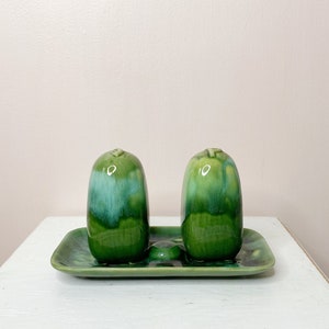 Vintage marble green shaker set, ceramic salt and pepper shakers on a platter