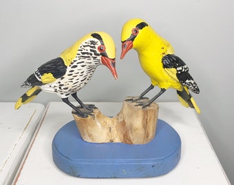 Hand carved wooden bird figurines