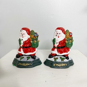 Vintage Christmas door stepper, Cast iron Santa Claus door stop