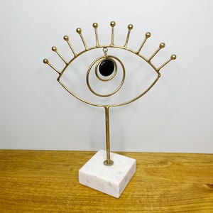 Green evil eye statue, brass and marble evil eye decor made in India