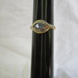 Pretty Gold Plated Sterling Silver Modern Stylized Ring With Faceted Center Stone