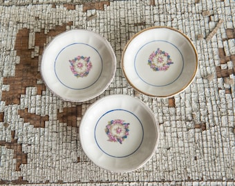 Three dainty floral butter pats; wonderfully aged, antique tiny porcelain plates