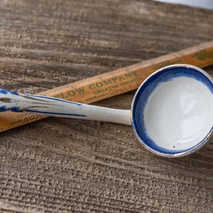 Lovely antique ladle, white ironstone with a subtle flow blue pattern, Victorian era