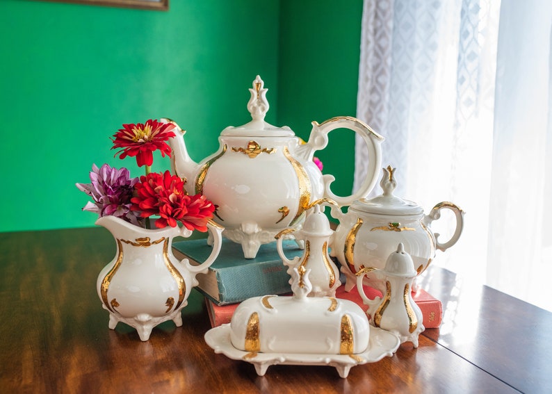 Luxurious LOMA tea set butter dish and salt pepper teapot creamer sugar signed mid-century white with gold motif