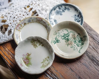 Mixed set of four butter pats; antique English ironstone; Victorian era; Johnson Brothers; Grindley