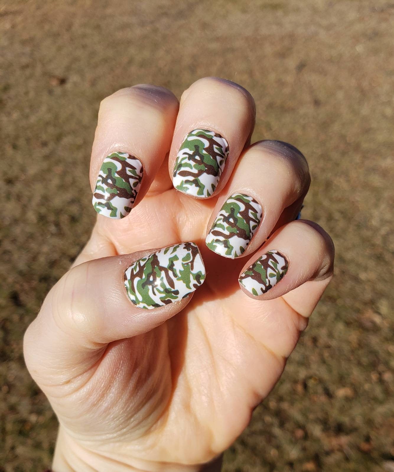 Miley Cyrus' Dope Camo Nails · How To Paint Patterned Nail Art · Beauty on  Cut Out + Keep