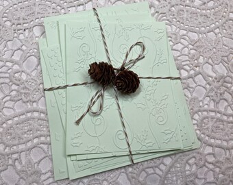 Variatie 1: pastelgroen papier met kerstthema en reliëf, 8 verschillende ontwerpen - ephemera scrapbooking voor junkjournalen