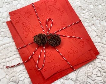 Variatie 1: felrood papier met kerstthema in reliëf, 8 verschillende ontwerpen - ephemera scrapbooking voor junkjournalen