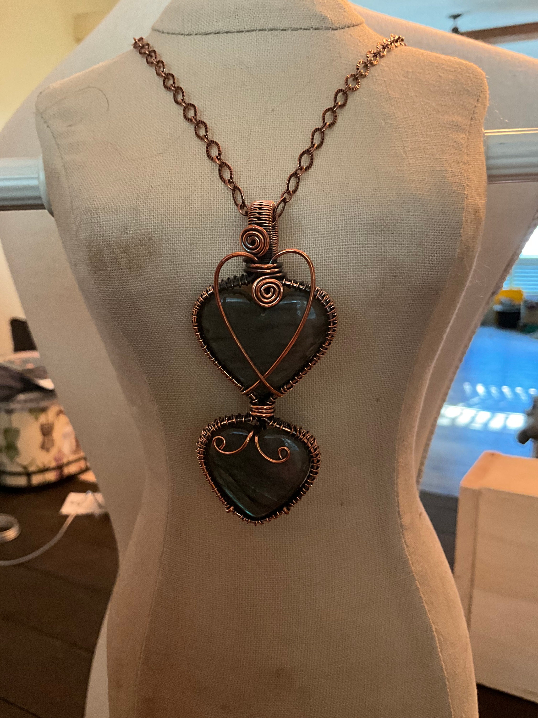 Multi stone, copper wrapped necklace on multi cord/ribbon necklace