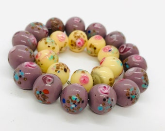 Murano lampwork pink green and rust glass beads with vintage pink crystal beads antique brass finish.